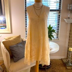Ivory lace dress. Some lace is loose